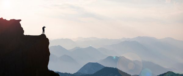 Man standing on cliff