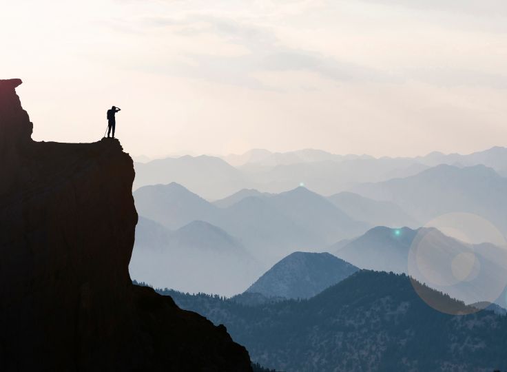 Man standing on cliff