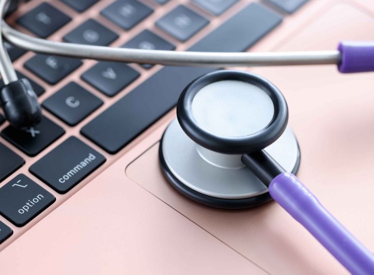 Stethoscope on laptop