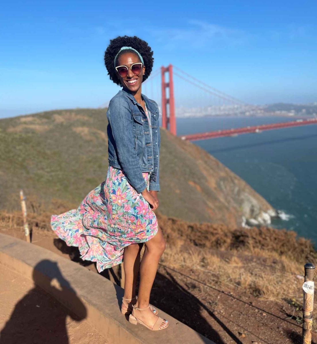 Woman in san francisco in front of golden gate bridge